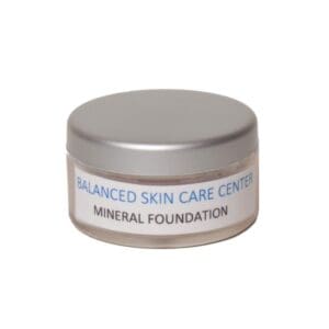 A jar of skin care product with the lid off.